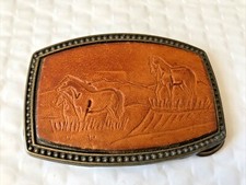 Rectangle Leather and 681 Brass Belt Buckle Horses in a field
