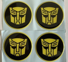 ALLOY WHEEL CENTRE CAP STICKER DOME RESIN X4 TRANSFORMER BLACK YEL  AUTOBOT 50mm