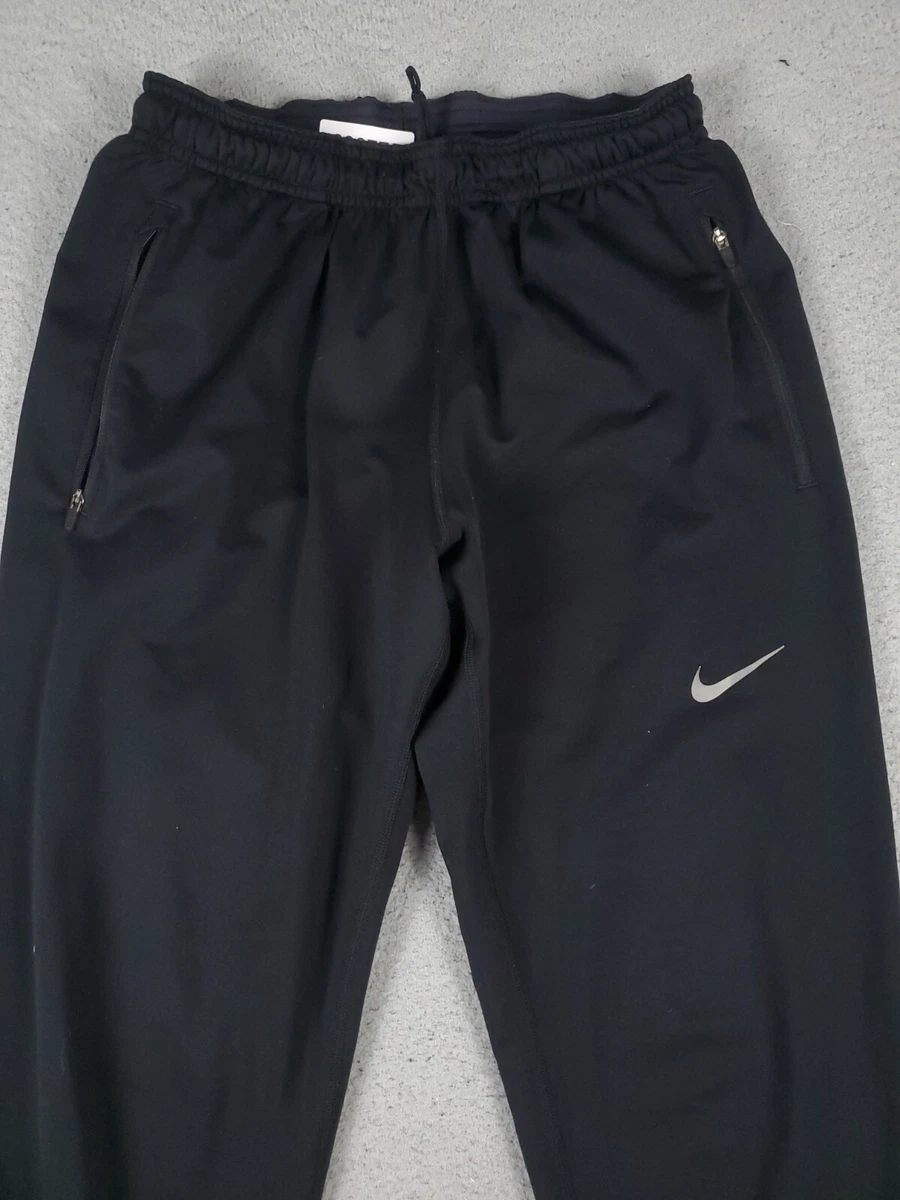 Nike joggers zip ankle sales