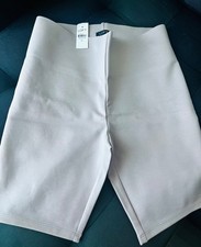 women biker shorts in medium color light pink new with tag
