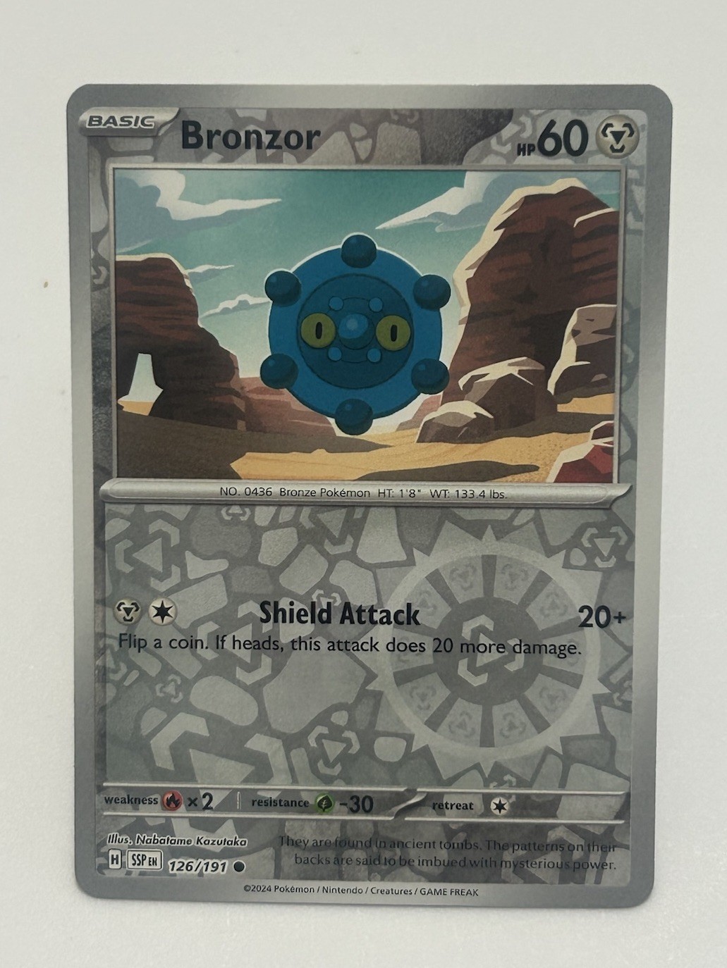 Pokemon Bronzor Reverse Holofoil SV08: Surging Sparks Common 126/191 NM