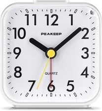Small Battery Operated White Analog Travel Alarm Clock