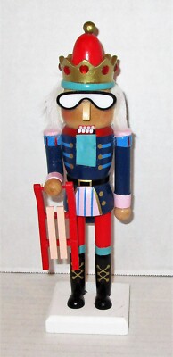 CHRISTMAS NUTCRACKER 10 inches  NUTCRACKER KING HOLDING A SLED