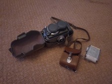 Rolleiflex Baby Grey TLR Camera with original Case, Strap and cased Lens Hood
