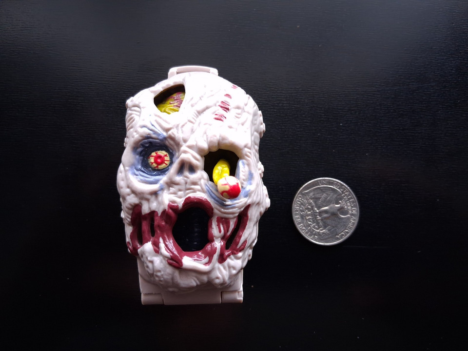 A complete vintage Mighty Max Horror Heads set — Zomboid, Corpus, and Ax Man (Spike) — a tiny pocket-sized horror universe that's increasingly hard to find complete.