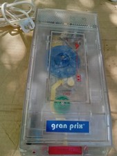 REBOBINADORA DE CINTA VINTAGE GRAN PRIX VER A TRAVÉS VHS TVR90 LÍNEA DELGADA TRANSPARENTE AÑOS 90