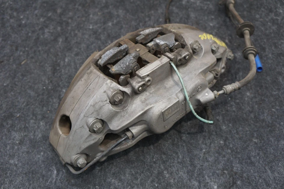 Pinza de freno delantera izquierda plateada OEM 34116891299 BMW 750i XDrive G12 2016-22 Foto 3 de 4