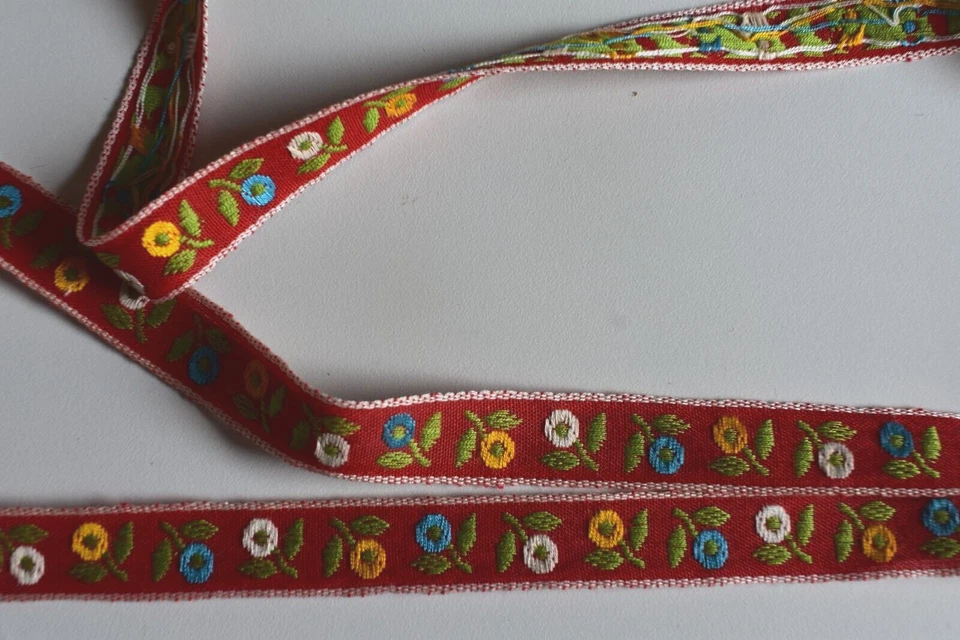 JACQUARD  FLORAL DESIGN  BRAID  TRIM  ON RED   3 YARDS  X 5/8  INCHES WIDE - Image 2 of 2