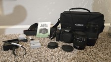 Canon EOS Rebel T3i 18.0MP Digital SLR DSLR Camera with Extras