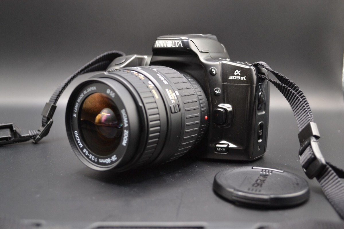 MINOLTA α 303si + Sigma Lenses 28-80mm & 70-300mm + Bag