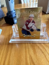 2025-26 Allure DOUBLooNS Nathan MacKinnon Case Hit DB-41 Mint