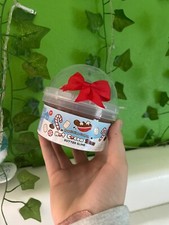 Hot coco butter slime the slime is brown with charms marshmallows, and sprinkles