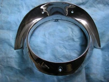 1957 Cadillac Head Light Bezel Door WITH INNER FENDER MOUNTING RETAINER BRACKET