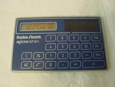 RADIO SHACK MICROTHIN SOLAR POWERED CALCULATOR EX-413