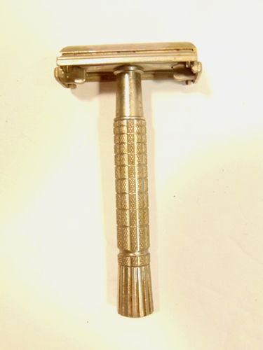 older steel colored Gillette safety razor marked F and 3 on head