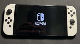 Nintendo Switch OLED Model HEG-001 64GB White Game Console with Dock and HDMI.
