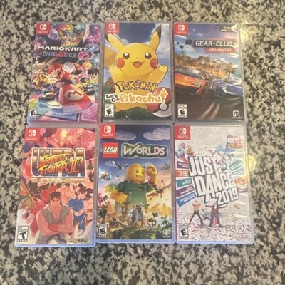 Nintendo Switch Game Lot Mario Kart 8 Deluxe Pokémon LEGO Worlds Just Dance