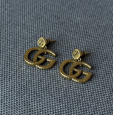 Gucci Interlocking Gold Tone GG Dangle Drop Earrings Textured Logo Luxury