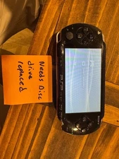 Sony PlayStation Portable Parts/Repair w/ games and movies.  Needs New Drive