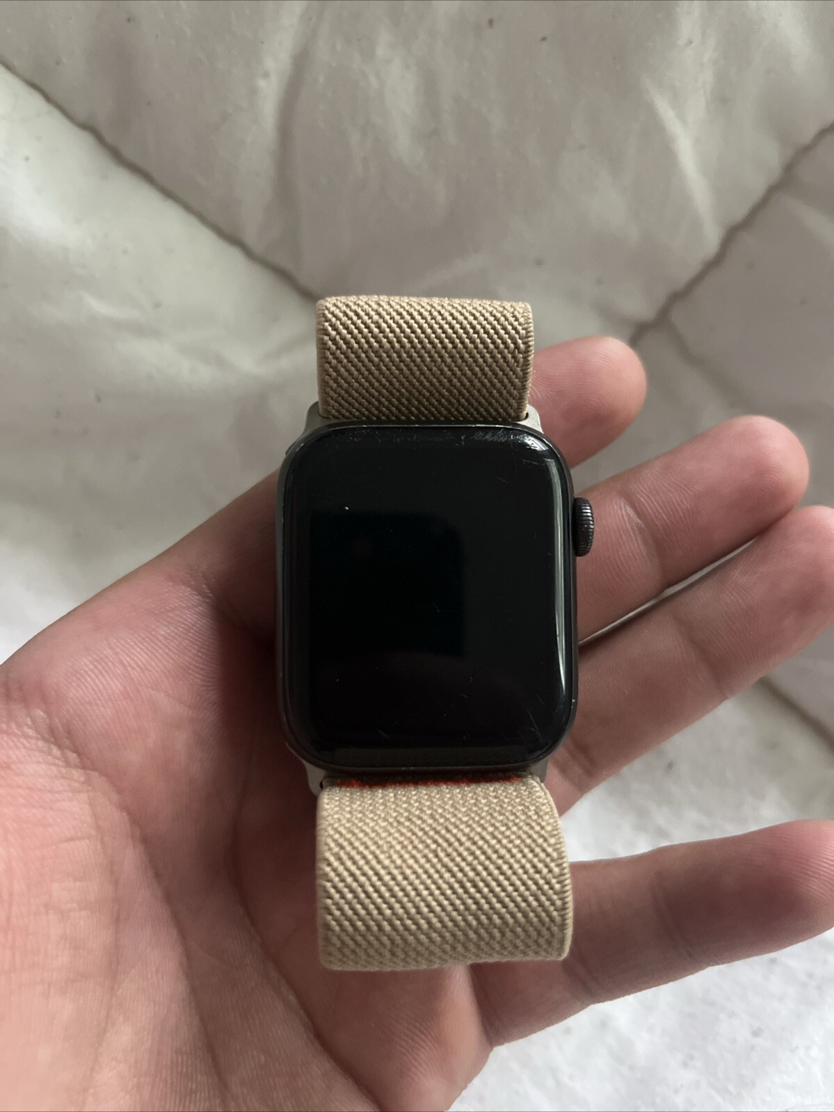 Apple Watch SE 44mm with Tan Sport Band-image