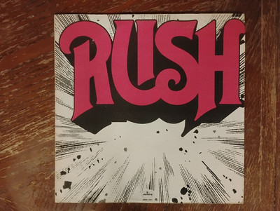 RUSH 'RUSH' DEBUT LP 1974. PLAY TESTED NO SKIPS, CRACKLES OR POPS.  REISSUE LP.