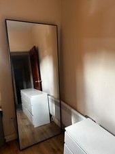 Black Hovet mirror. No scratches or marks.