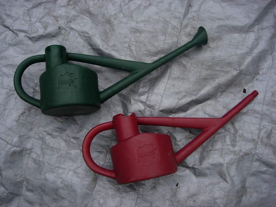 TWO PLASTIC WATERING CANS eBay