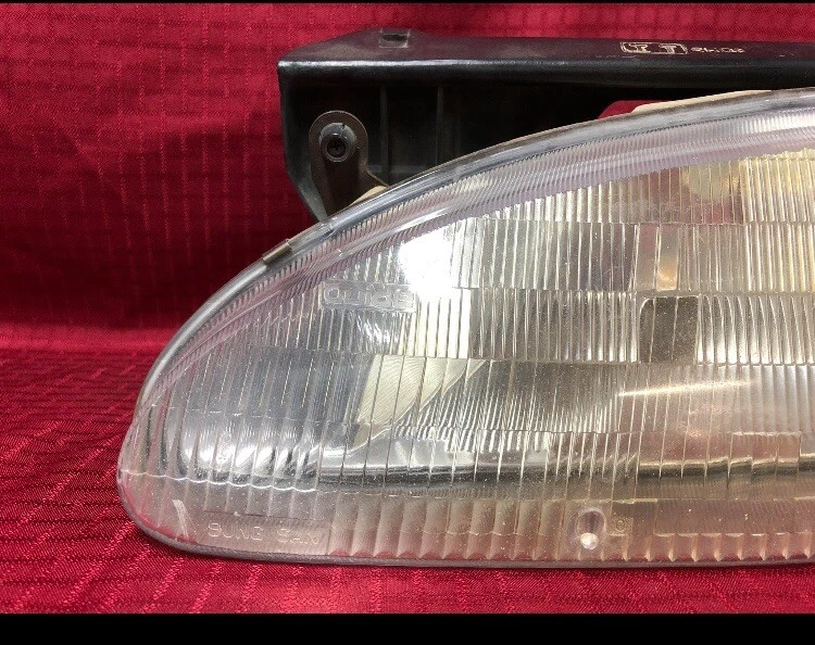 1993 Pontiac LeMans Left Side Headlight And Mount Panel CLEAR DN - Image 2 of 4