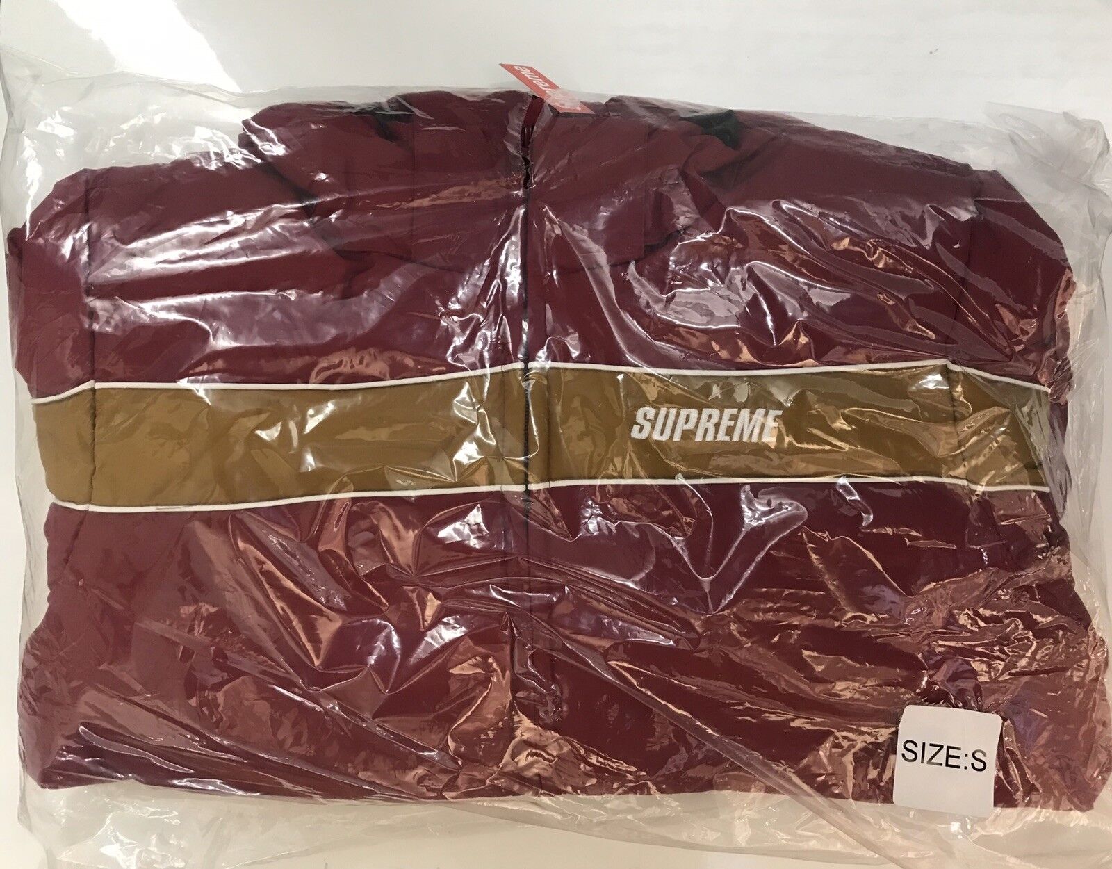 Supreme Stripe Panel Down Jacket Burgundy Size S Brand new in plastic