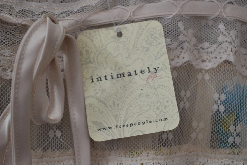 NUEVO CON ETIQUETAS Free People Making Moves Midi en Marfil Pequeño Vestido Combo de Té Floral Informal Foto 4 de 4