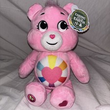 2023 Care Bears Hopeful Heart Bear Plush Pink Rainbow Heart Belly Badge NWT