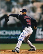CARLOS CARRASCO  CLEVELAND INDIANS   ACTION SIGNED 8x10
