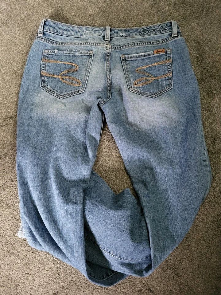 Pantalones de mezclilla elásticos para mujer Seven7 acampanados destruidos claros desteñidos talla 28 Foto 3 de 4