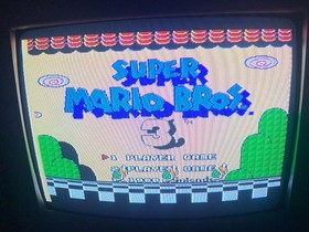 NES Konsole + 8 Spiele + 3 Controller + Four Score Adapter Nintendo Mario Bros