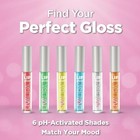 Clear plastic tubes of Shimmer Lip Gloss pH Activated with jeweled jade caps, arranged in gradient shades of pink, red, and gold.