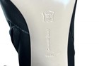 Black leather Gianvito Rossi ankle boot heel with white pointed toe, size 40.5 US 10.5 Italy, on glossy black stock.