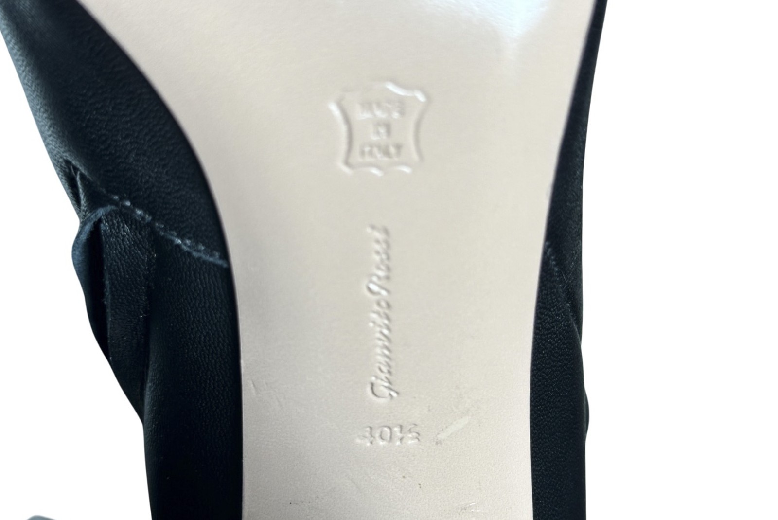 Black leather Gianvito Rossi ankle boot heel with white pointed toe, size 40.5 US 10.5 Italy, on glossy black stock.