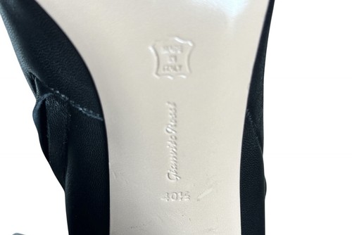 Black leather Gianvito Rossi ankle boot heel with white pointed toe, size 40.5 US 10.5 Italy, on glossy black stock.