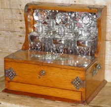 Antique Oak Games Gambling Tantalus & 3 Crystal Cut Glass Decanters Hidden Draw