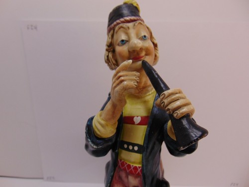 Vintage Clown Playing Flute