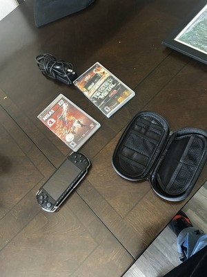 Sony PSP-3000 w/ Charger, Case, 28 Different games.
