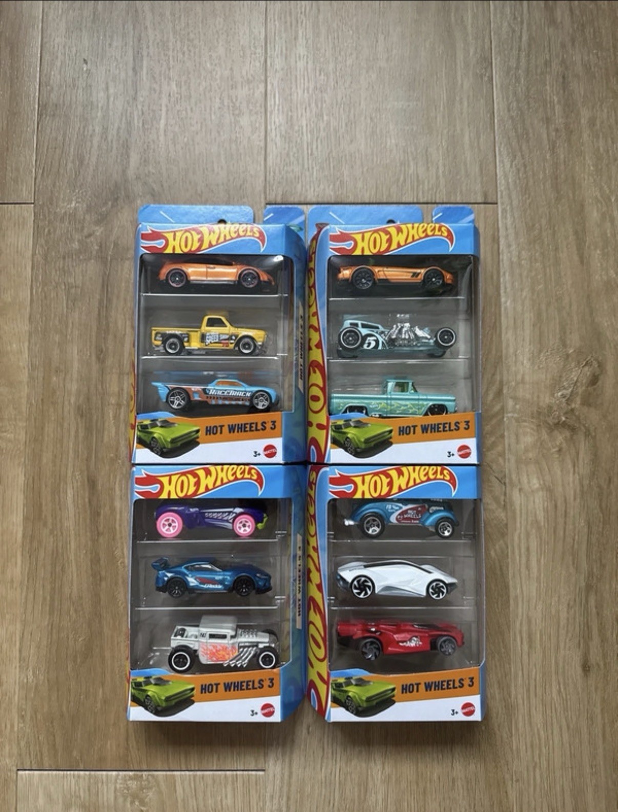 Hot Wheels lot 12 voitures pour circuit de course et garage enfant Mattel
