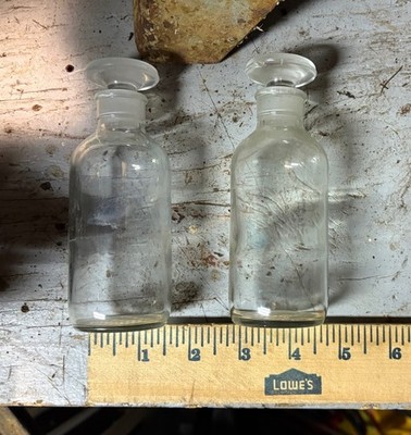 (2)Armstrong Glass Bottles With Lids