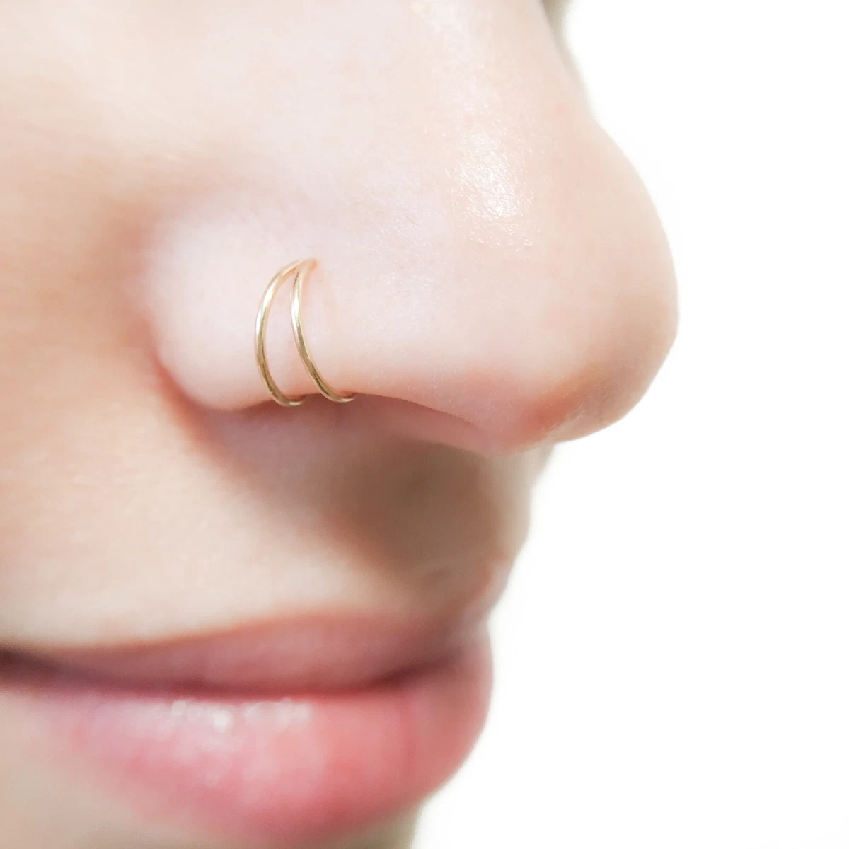 Double nose ring for clearance single piercing