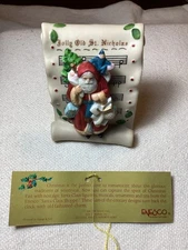 Vintage John Gross an 1990 Enesco “The Gifted Line” Santa On Music Scroll. W/Tag