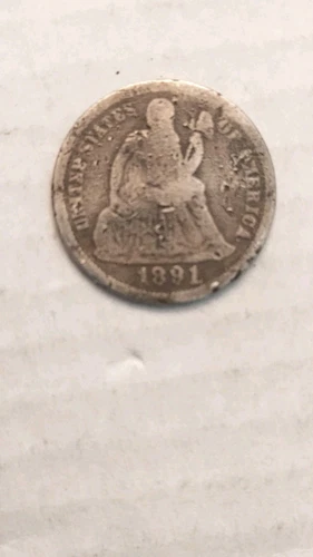 1891 Philadelphia Silver Seated Liberty Dime. VG condition, but you judge.   475