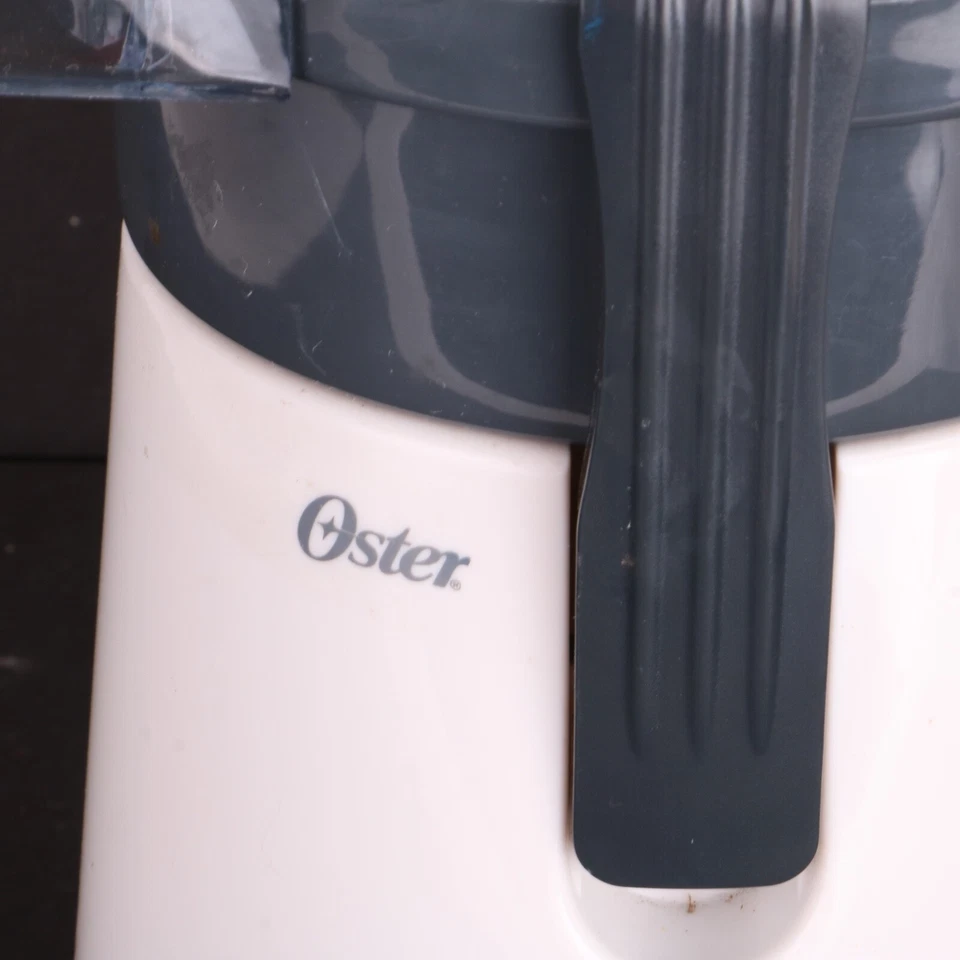 Extractor de jugo Oster 3157 que falta empujador Foto 4 de 4
