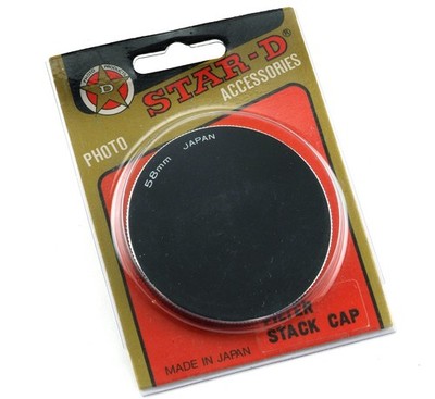 VINTAGE NEW OLD STOCK  STAR D  58MM STACK CAP IN ORIGINAL PACKAGE.