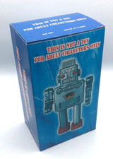 Blue Robot Spaceman Windup Tin Toy Robot NIB Circa 2000 Non-Smoking edition.