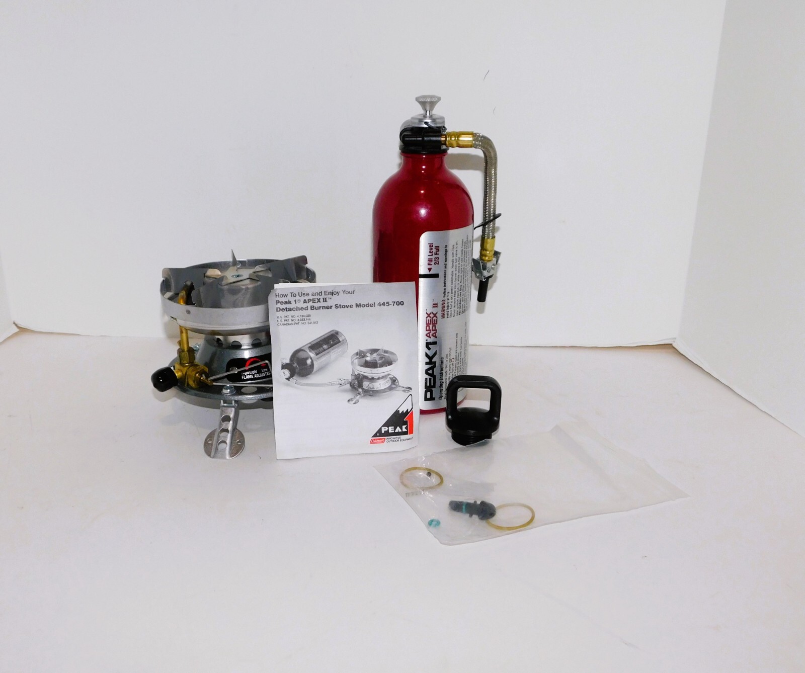 COLEMAN PEAK 1 APEX II CAMPING STOVE 445-700 W/CANNISTER, SERVICE